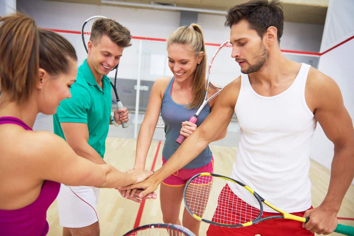 Squash Team Holding Hands